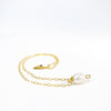 side angle view of White Baroque Pearl on 14k Gold Chain Necklace by Judie Raiford