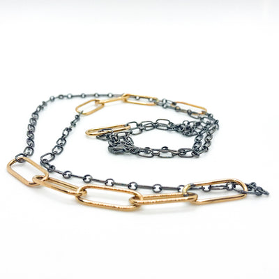 side angle view of 30" 14k Gold Filled Oval Links on Oxidized Sterling Chain Necklace by Judie Raiford