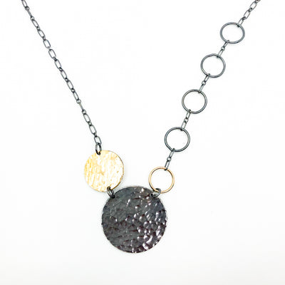 pendant detail view of Oxidized Sterling and 14k Gold Fill Hammered Circles Necklace by Judie Raiford