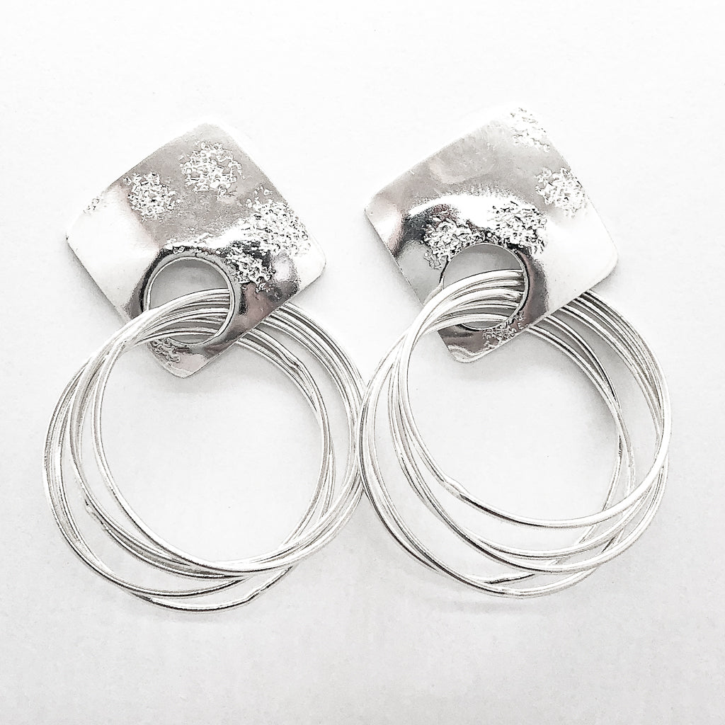 polished Sterling silver Square Top Slinky Post Earrings by Judie Raiford