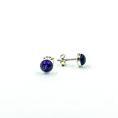 side angle view of 6mm Amethyst Cabochon Stud Earrings by Judie Raiford