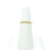 14k Gold Filled Hammered Stack Ring by Judie Raiford displayed on white ring stand