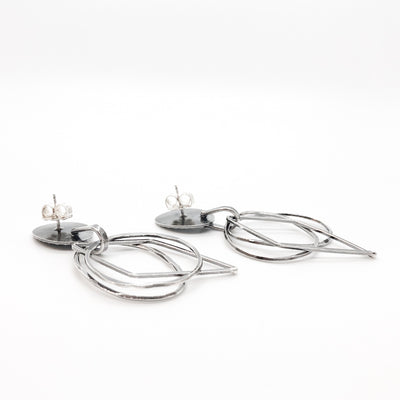 back angle view of Oxidized Sterling Silver Oval Top with 3 Dangles Earrings by Judie Raiford