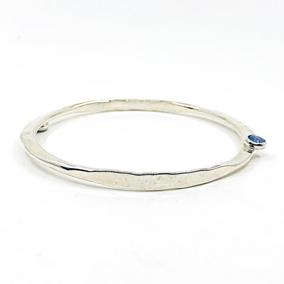 side angle view of Sterling Naught Bangle with Opal by Judie Raiford
