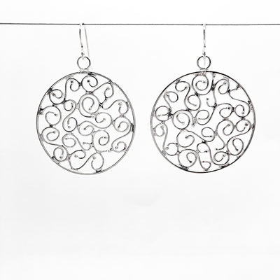 sterling silver Stella Earrings by Judie Raiford hanging on wire