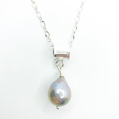 detail view of Big Juicy Pearl Necklace with Gray Baroque Pearl by Judie Raiford