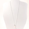 Big Juicy Pearl Necklace with White Baroque Pearl by Judie Raiford hanging on white mannequin cut out