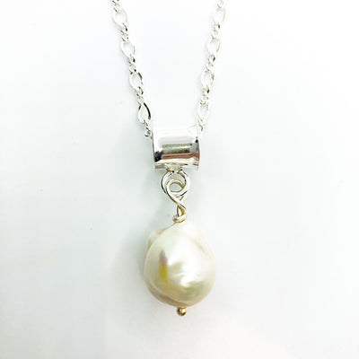 detail view of Big Juicy Pearl Necklace with White Baroque Pearl by Judie Raiford