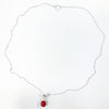 flat lay view of sterling silver Big Juicy Stone Necklace with Red Coral by Judie Raiford