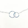 detail view of the connecting circles in the pendant in Sterling silver Maggie Necklace by Judie Raiford