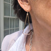 Gold Filled Hammered Triangle Earrings by Judie Raiford worn by model