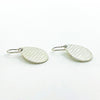 side angle view of Sterling Aquapear Earrings by Judie Raiford
