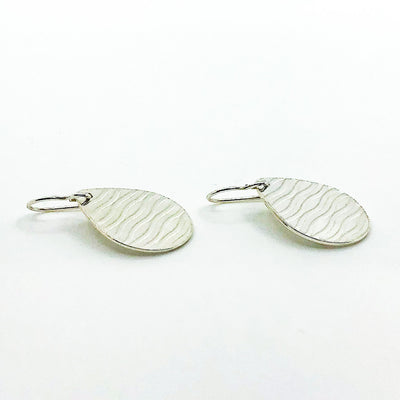 side angle view of Sterling Aquapear Earrings by Judie Raiford