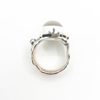 over top view of Sterling and 14k Anticlastic Deckled Edge Moonstone Ring by Judie Raiford