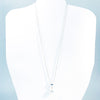 White Baroque Pearl on Sterling Long Short Chain by Judie Raiford on white mannequin display bust