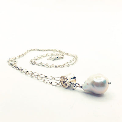 side angle view of White Baroque Pearl on Sterling Long Short Chain by Judie Raiford