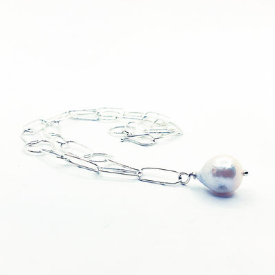 side angle view of Baroque Pearl on Handmade Chain Necklace by Judie Raiford