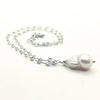 side angle view of White Baroque Pearl on Sterling Long Short Chain by Judie Raiford