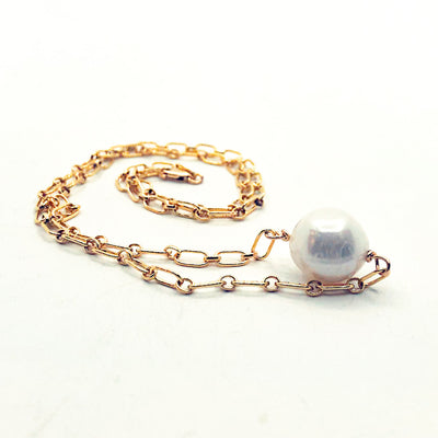 side angle view of Single White Pearl on 14k Gold Filled Long Short Chain by Judie Raiford