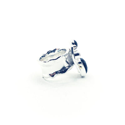 right side view of size 7.5 Sterling Silver Half Platter Ring with 14k and Blue Green Tourmaline by Judie Raiford