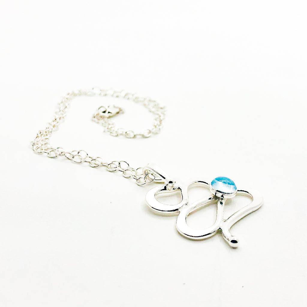Sterling Touch of Romance Necklace with Swiss Blue Topaz