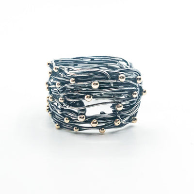 left side view of Custom Oxidized Sterling Random Theory Cuff with Gold Ball Option by Judie Raiford