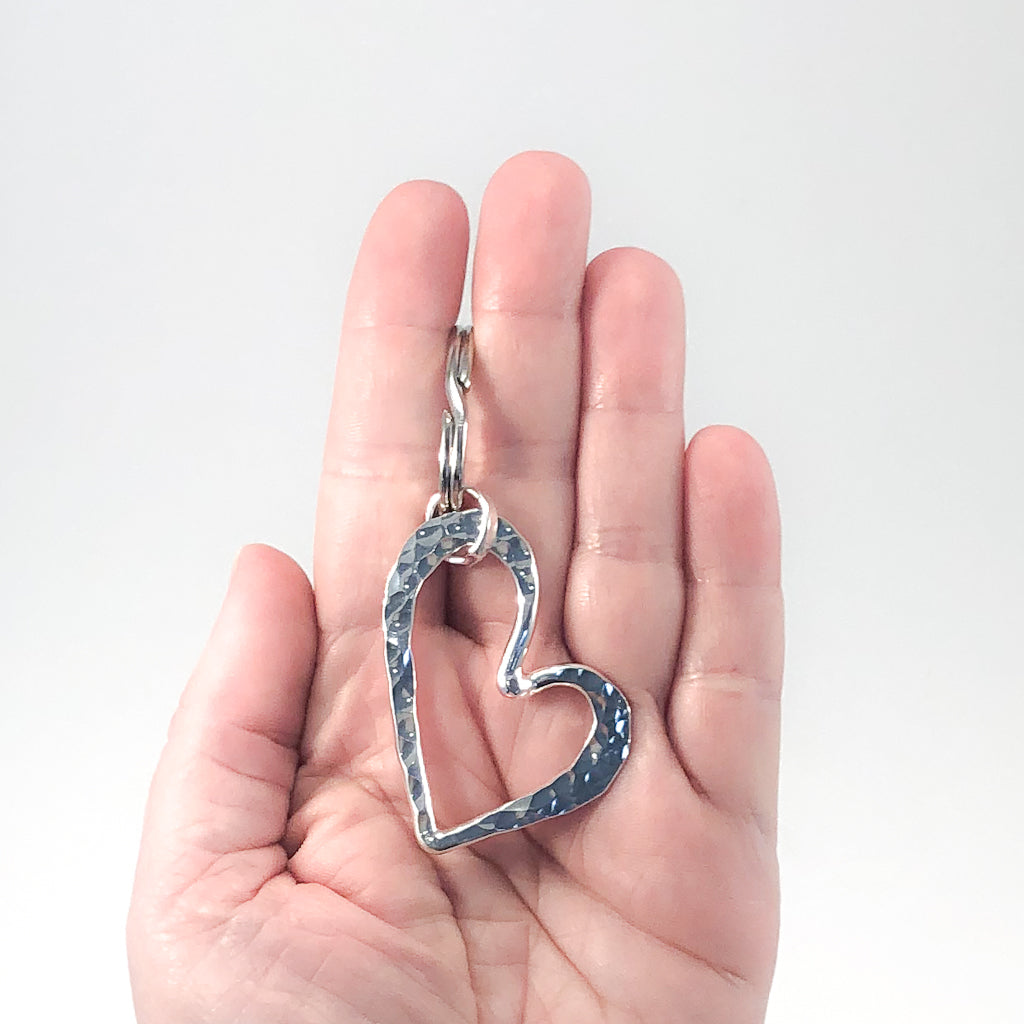 Sterling Heart Keyring by Judie Raiford held in hand