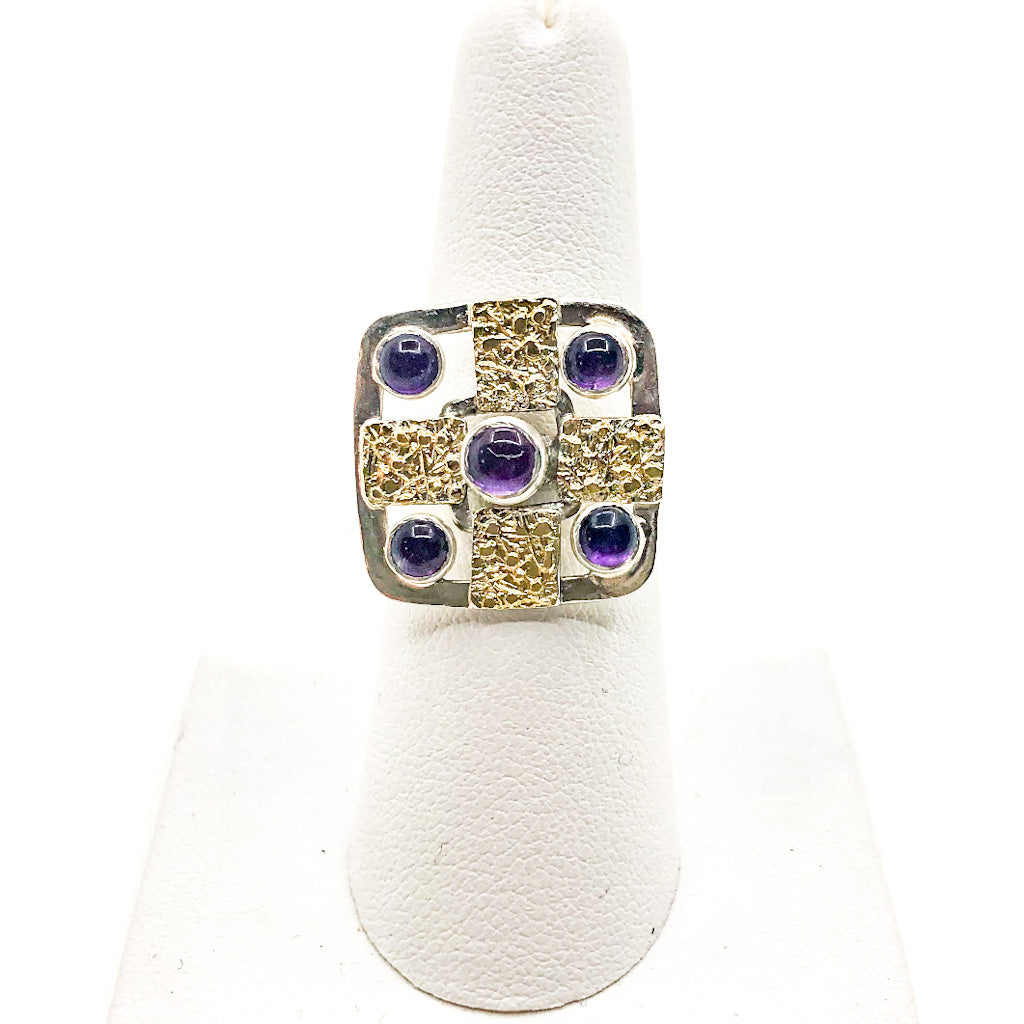 size 7 Square Five Amethyst Ring by Donna Burdic on white ring display stand