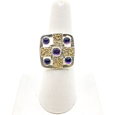 size 7 Square Five Amethyst Ring by Donna Burdic on white ring display stand
