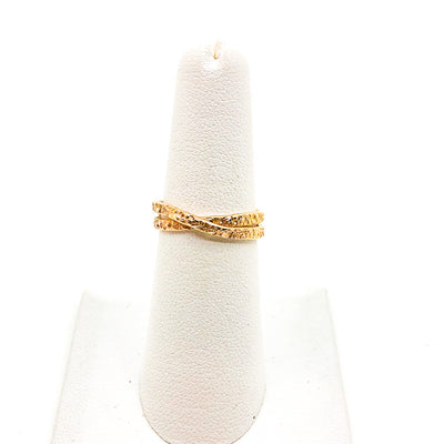 size 6.5 14k Gold Filled Infinity Ring by Donna Burdic on white ring display stand