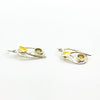 side angle view of Sterling and 22k Citrine Small Oval Leaf Hook Earrings by Donna Burdic
