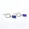 side angle view of Sterling Circle Drop Earrings with Amethyst by Berlin Randall