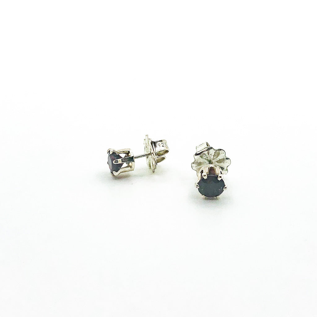 side angle view of 6mm Garnet Stud Earrings by Berlin Randall