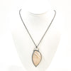 White Moss Agate Necklace by Berlin Randall on white display mannequin bust