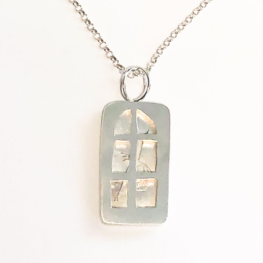 Close up detail of pendant part of Windows of Opportunity Necklace by Ling-Yen Jones