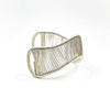 right side view of Sterling Asymmetrical L Wave Cuff by Tana Acton