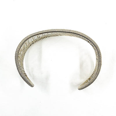 over top view of Sterling Asymmetrical L Wave Cuff by Tana Acton