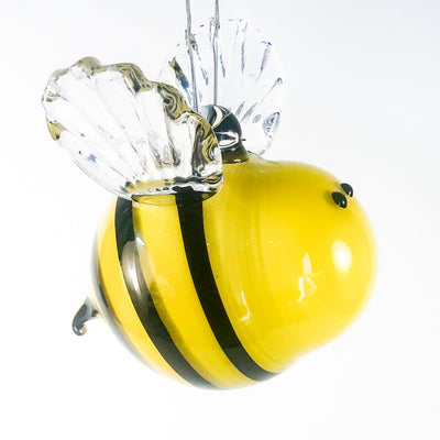 side view of Yellow Blown Glass Bee by Jennifer Nauck