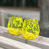 pair of Yellow Speckled Wine Tumblers by Nate Nardi in outdoor setting