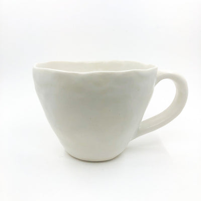 White Latte Cup by Nona Kelhofer