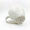 bottom view of White Latte Cup by Nona Kelhofer