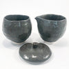 view of Charcoal Sugar and Creamer Set by Nona Kelhofer with lid off the sugar bowl
