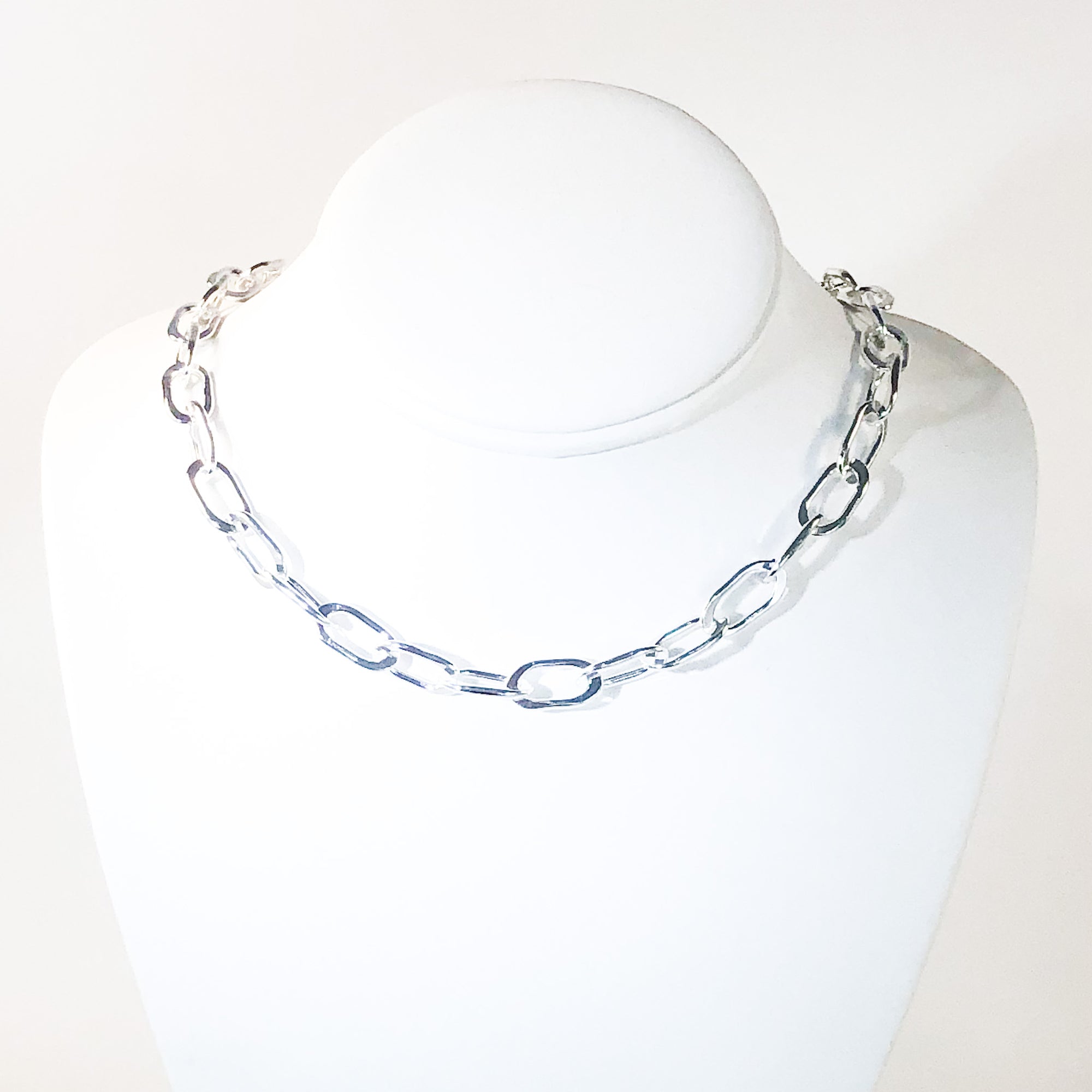 Sterling Junior Tow Truck Necklace by Judie Raiford on mannequin bust